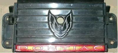 Tail Light Filler, 82-4 Ta Se, Used, Black, W/Emblem, Between Lights 1
