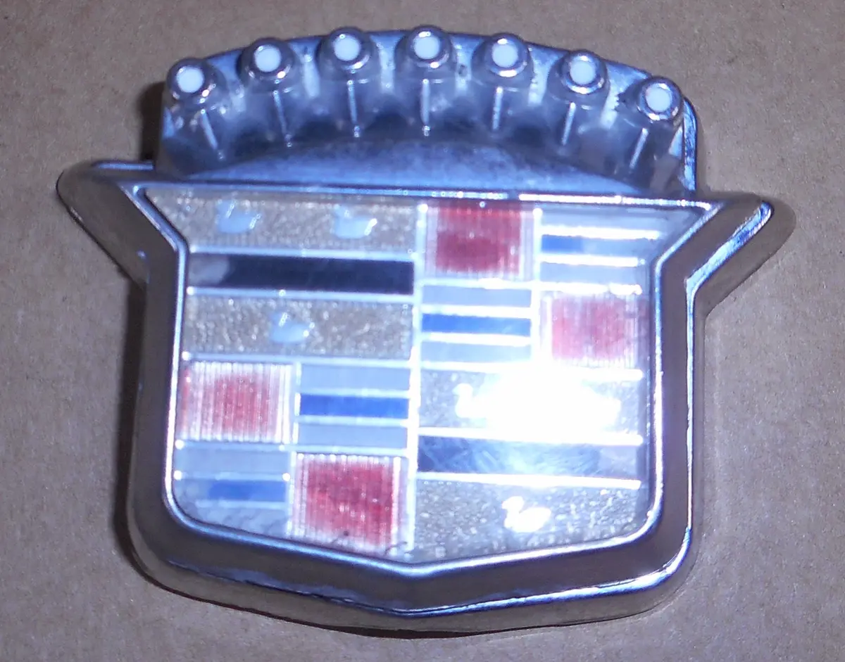 Trunk Lock Emblem ,Swivel Cover,Used 77-79 Deville 1