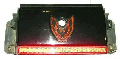 Tail Light Filler, 85-90 Ta Se, Used, Black W/Orange Bird, Between Lights 1