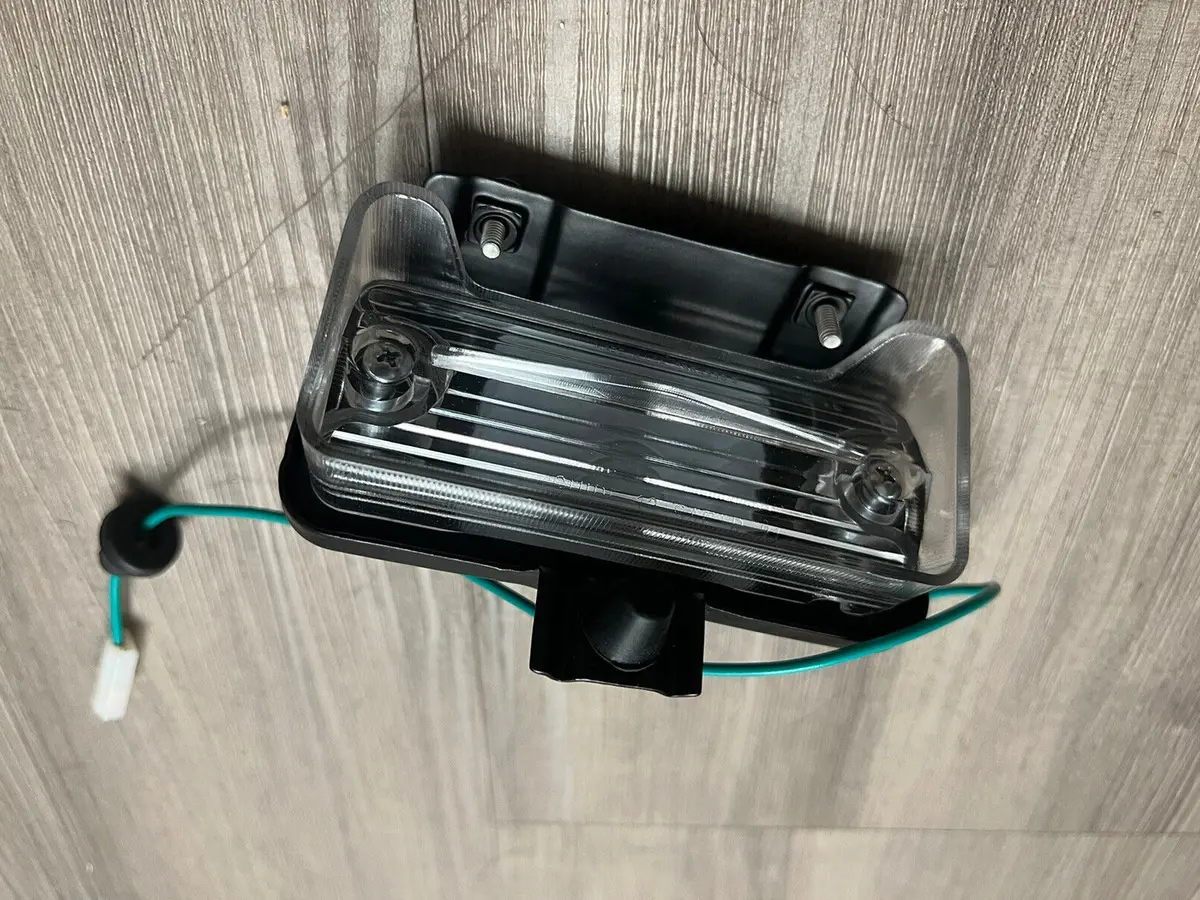 Backup Light Assembly ,New 70-3 Monte Carlo 1